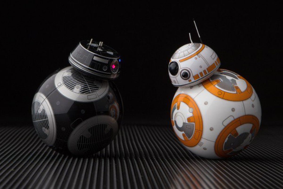 Star wars droids BB-9E and BB-8 are facing off against each other